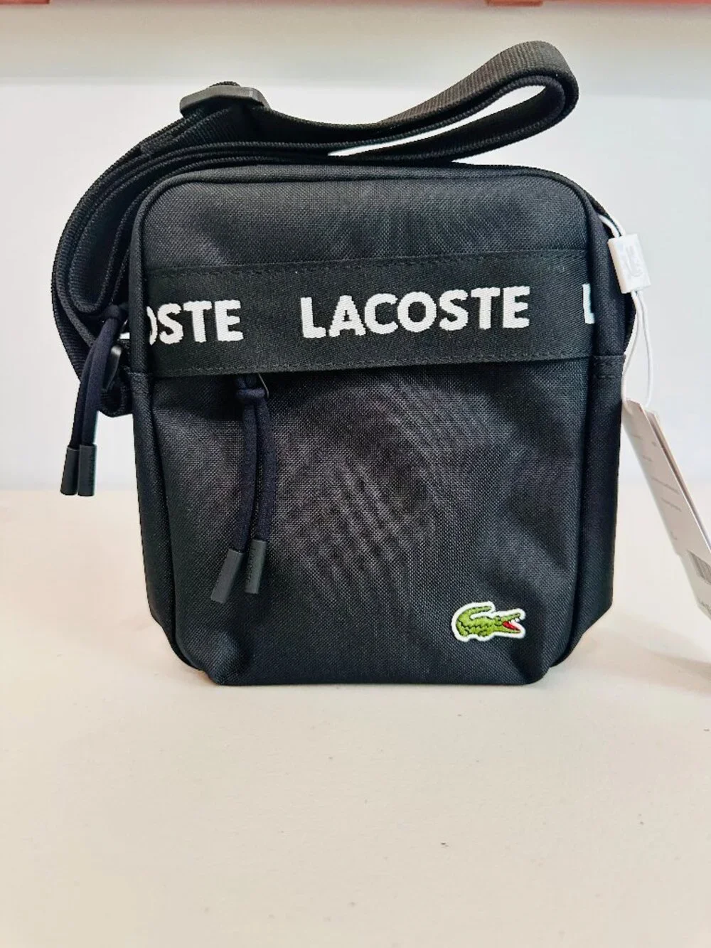 LACOSTE NEOCROC TAPE NOIR BLACK VERTICAL CAMERA CROSSBODY BAG UNISEX
